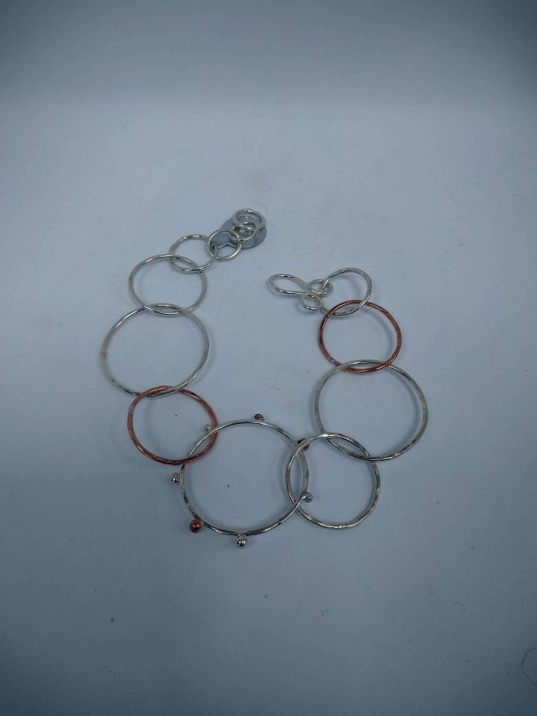 Silver and copper seed collection handmade link adjustable bracelet