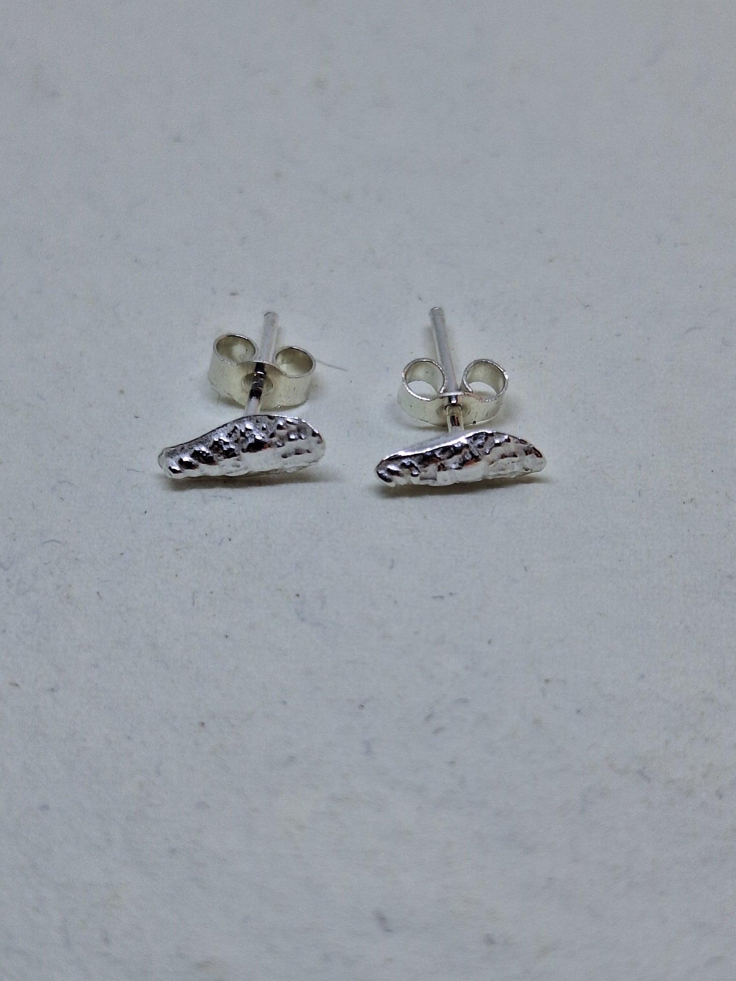 Tiny Auger shell stud earrings