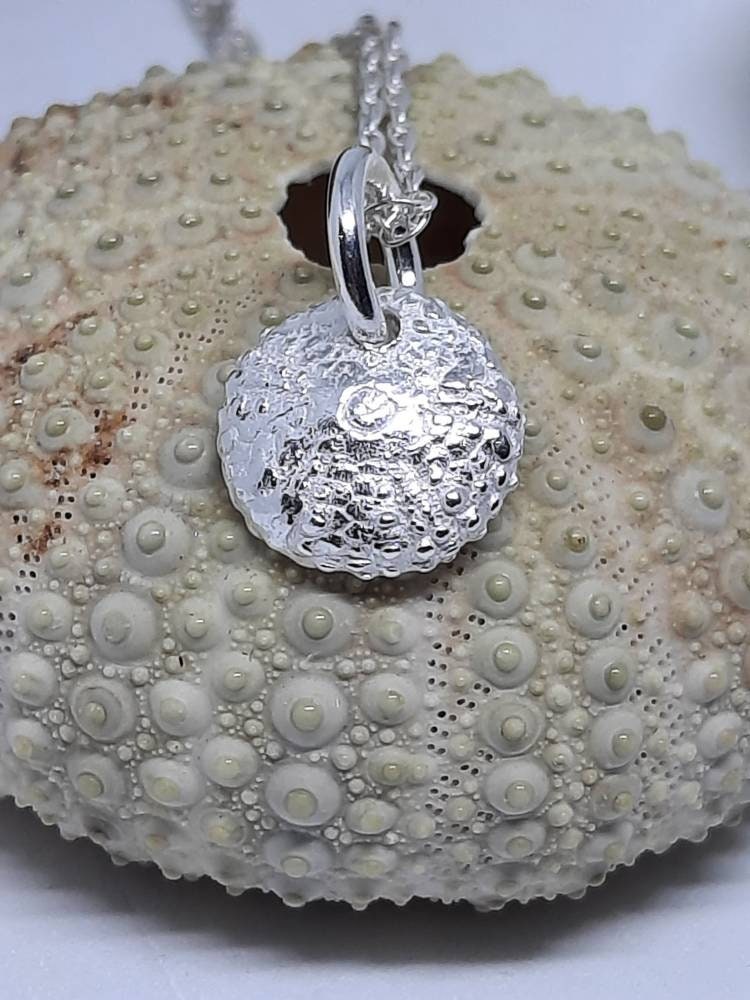 Sea urchin charm pendant